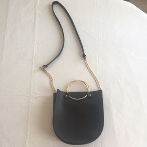 Black w/ gold hardware bag